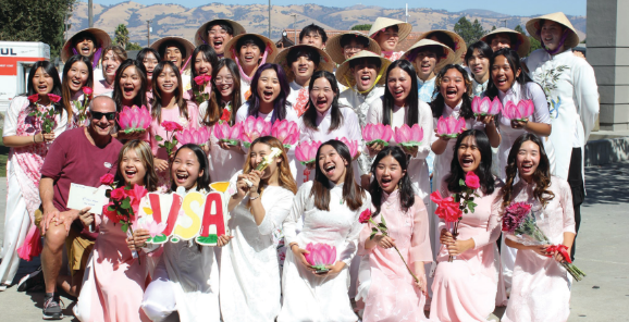 VSA dancers taking a group photo with their trophy after winning first place. This was their first ever victory.