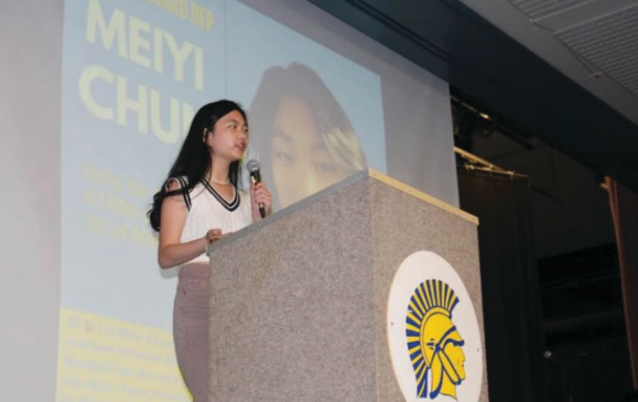 Meiyi Chung delivers her speech at the Candidate Showcase in the theater for the 2024-25 MHS Elections.