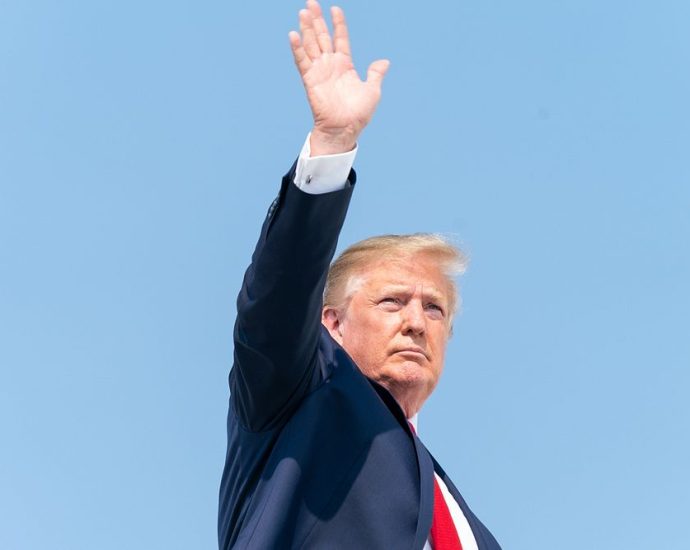 President Trump Returns from New Jersey President Donald J. Trump waves Sunday, July 7, 2019, as he prepares to board Air Force One at the Morristown Municipal Airport in Morristown, N.J., for his return to Washington, D.C. (Official White House Photo by Shealah Craighead). Original public domain image from Flickr