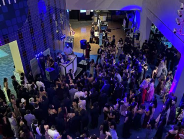 Students dance under the stars at Tech Interactive